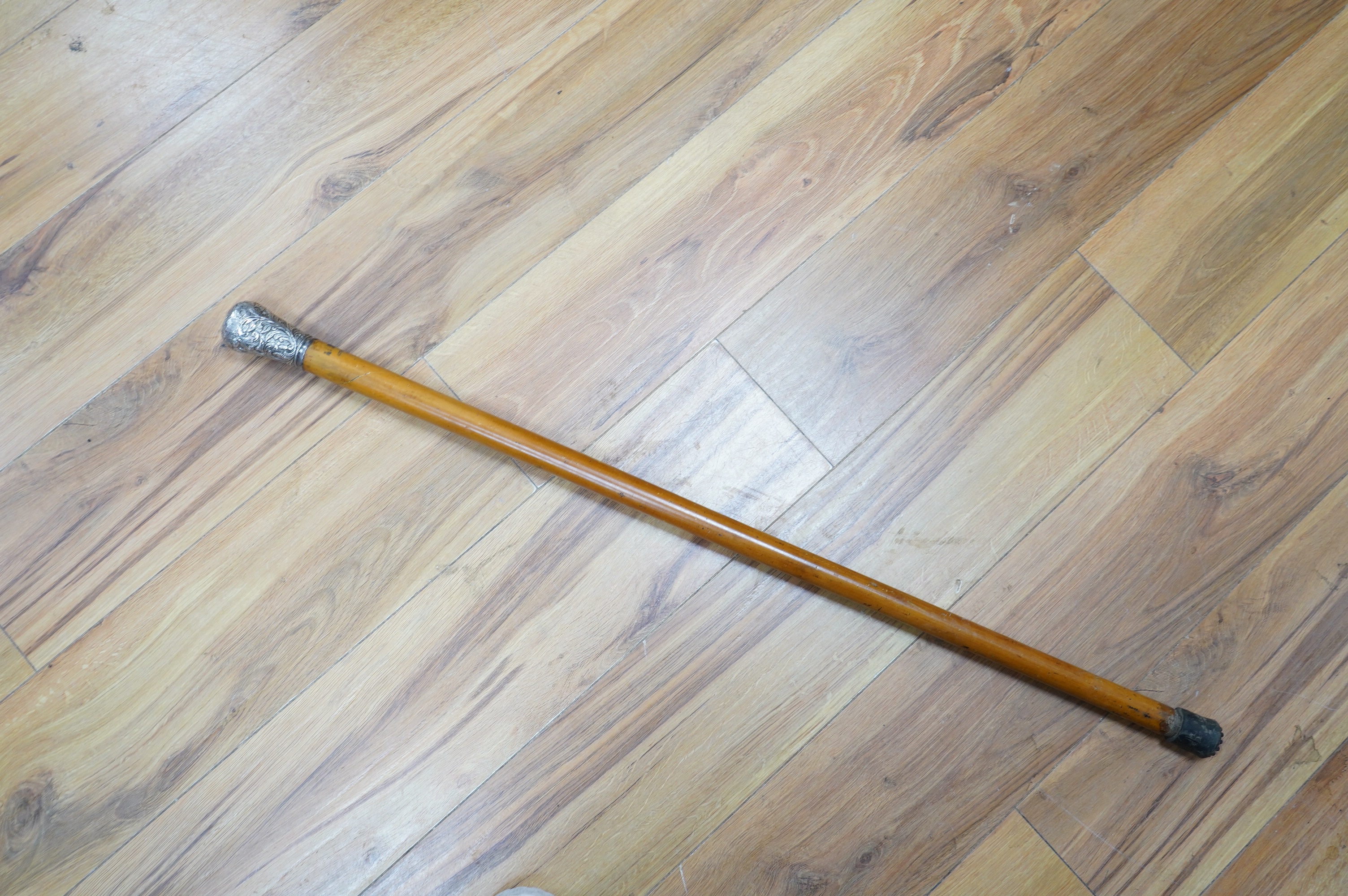 A Victorian silver mounted malacca walking stick, 92cm. Condition - fair to good.